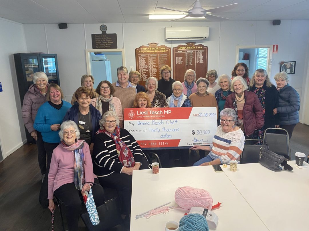 Member for Gosford, Liesl Tesch, presenting up with a grant cheque of $30,000 for the new kitchen
